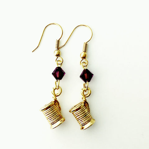 ____ Spool of Thread Gold Earrings with Purple Swarovski Crystals.
